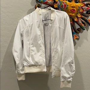 Reversible white lulu bomber jacket. Size small.